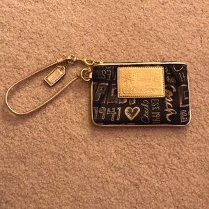 coach zip wrist wallet (never used)